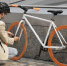 full-shot-man-securing-bicycle_1.jpg - GorodnaBire.Ru