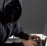 side-view-male-hacker-with-laptop_1.jpg - GorodnaBire.Ru