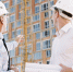 low-angle-people-with-helmets-looking-scaffolding-design_1.jpg - GorodnaBire.Ru
